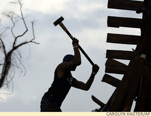Volunteer rebuilding New Orleans after Hurricane Katrina. 